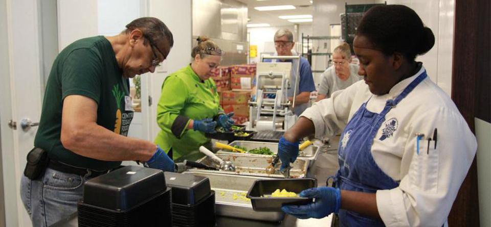 Tennant company pumps up their conference agenda with hands-on philanthropy