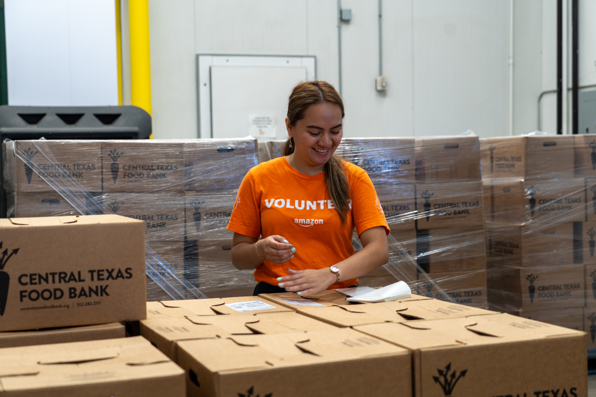CTFB Volunteer from Amazon with Home Delivery Program boxes