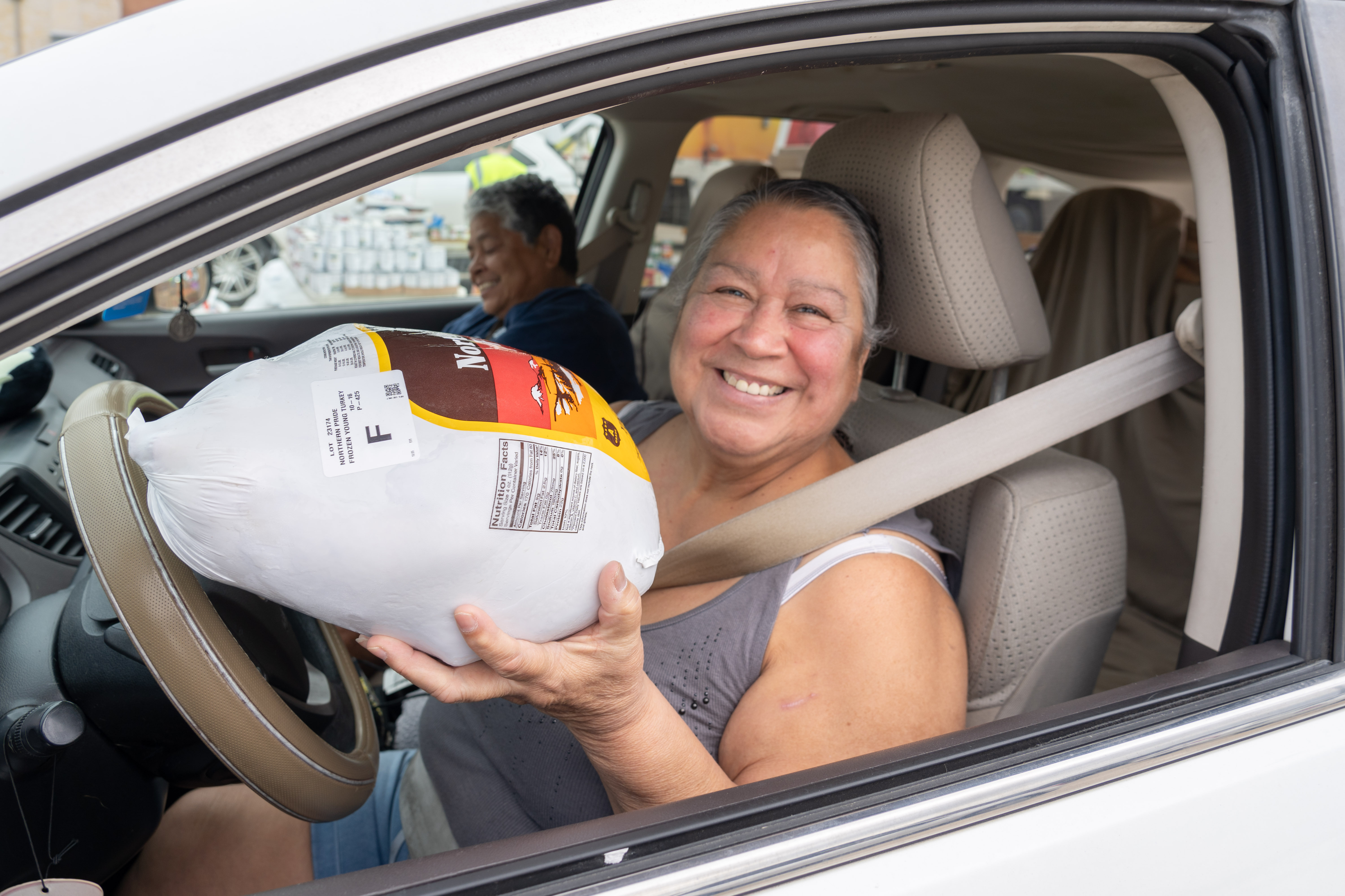 Mother of Coast Guard Veteran Receives Groceries to Make Nourishing Thanksgiving Meal