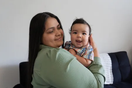 Mom with baby who receives CTFB's Medically Tailored Meals